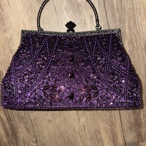 Lavish Purple Beaded Clutch
